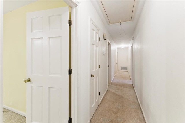 711 Kenilworth Rd, Tallahassee, FL 32312 - hall with attic access and light colored carpet