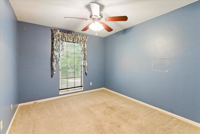 711 Kenilworth Rd, Tallahassee, FL 32312 - unfurnished room with carpet flooring and a ceiling fan