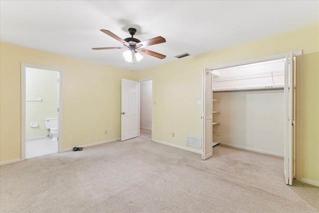711 Kenilworth Rd, Tallahassee, FL 32312 - unfurnished bedroom with carpet floors, a closet, ensuite bath, and ceiling fan