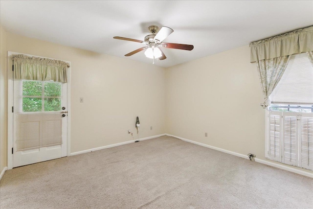 711 Kenilworth Rd, Tallahassee, FL 32312 - empty room with healthy amount of natural light, carpet floors, and a ceiling fan