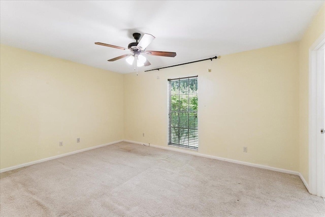 711 Kenilworth Rd, Tallahassee, FL 32312 - empty room with light carpet and a ceiling fan