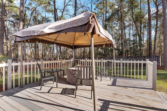 wooden deck featuring a gazebo