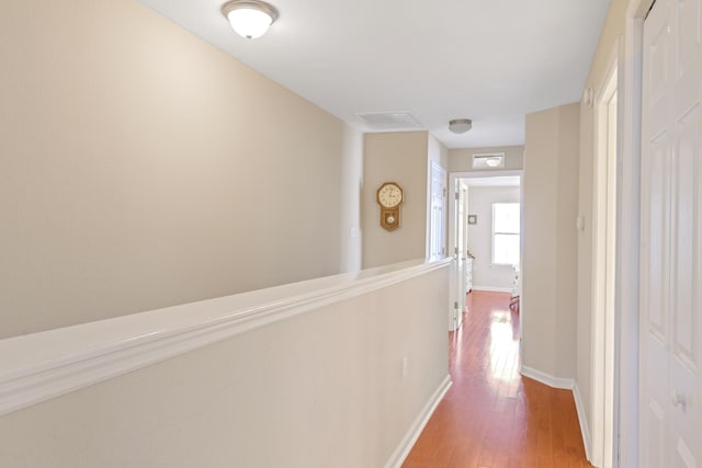 hallway featuring hardwood / wood-style floors