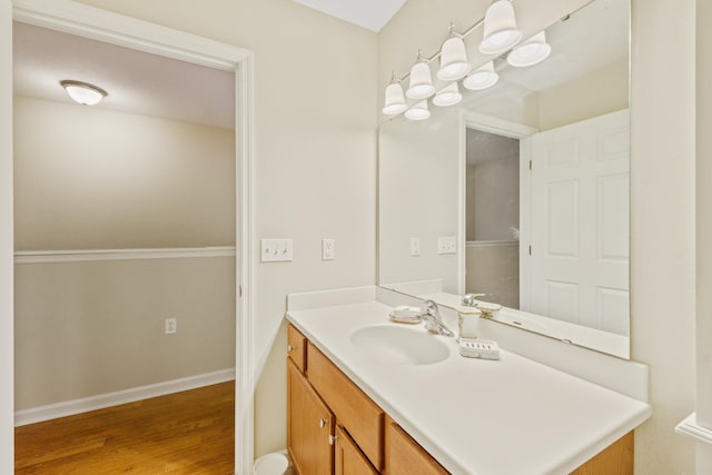 bathroom featuring vanity and wood-type flooring