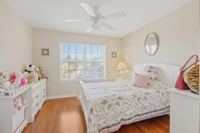 bedroom featuring ceiling fan and light hardwood / wood-style floors