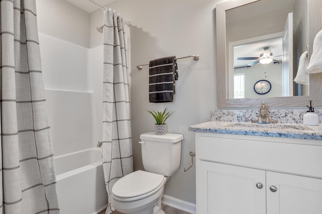 full bathroom with vanity, shower / bath combination with curtain, ceiling fan, and toilet