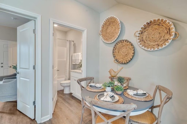 dining room with light wood-type flooring