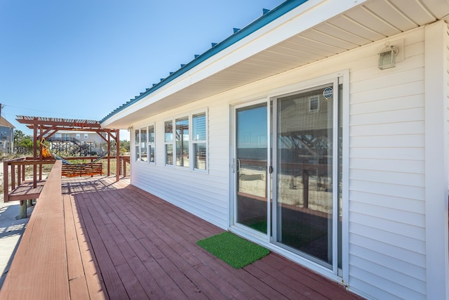 wooden deck featuring a pergola