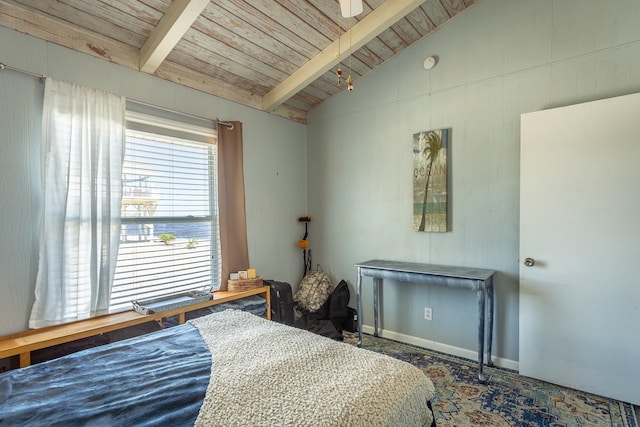 bedroom featuring wooden ceiling and lofted ceiling with beams