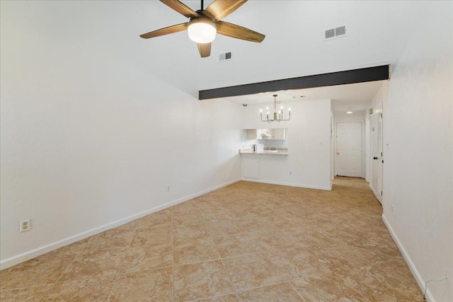 unfurnished living room featuring ceiling fan with notable chandelier, baseboards, and visible vents