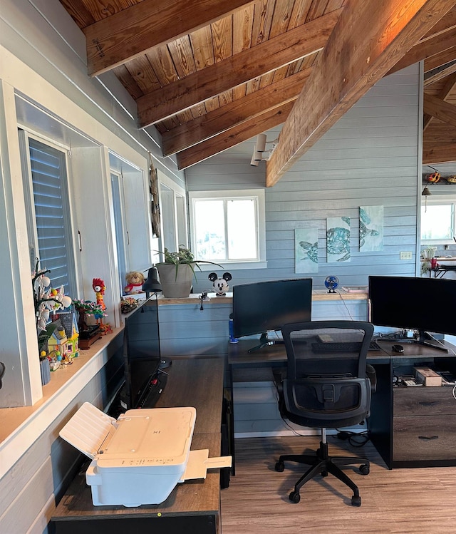 71 Royster Dr, Crawfordville, FL 32327 - office space with wood ceiling with exposed beams, wood finished floors, and wooden walls