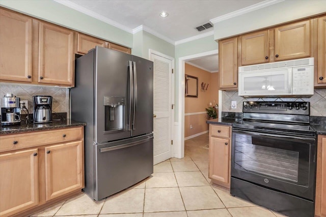 kitchen with white microwave, light tile patterned flooring, electric range, visible vents, and stainless steel refrigerator with ice dispenser