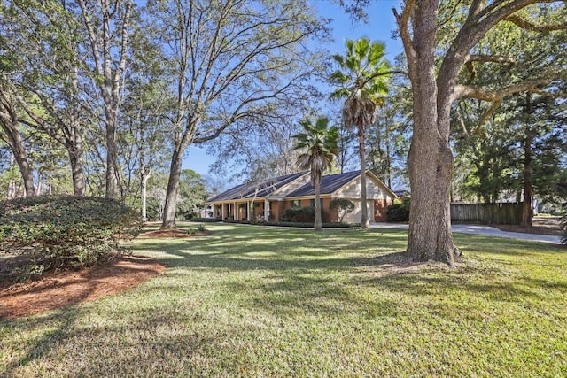 view of yard featuring fence