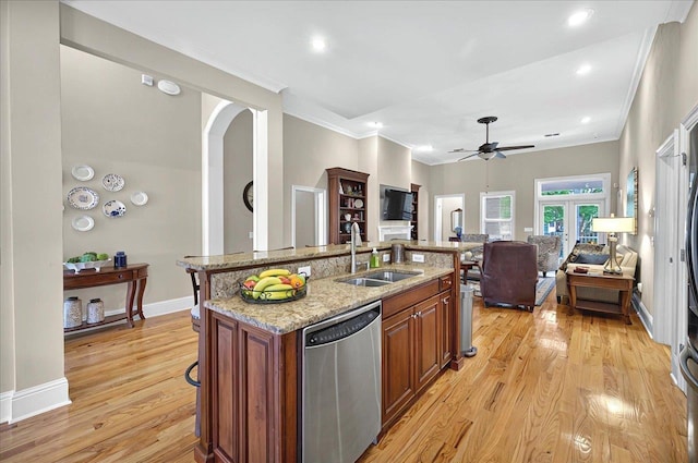2547 Bennits Mill Way, Tallahassee, FL 32312 - kitchen featuring stainless steel dishwasher, open floor plan, ornamental molding, and a sink