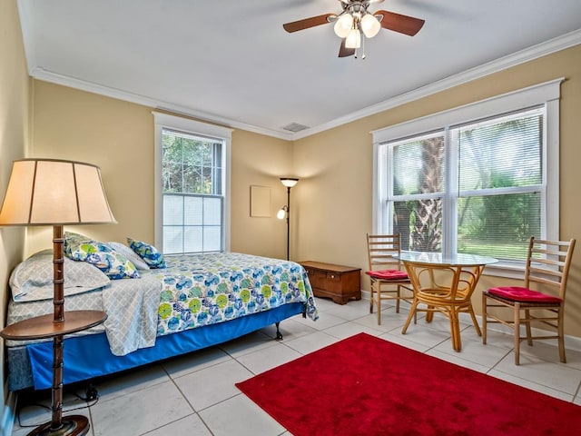 tiled bedroom featuring ceiling fan and ornamental molding