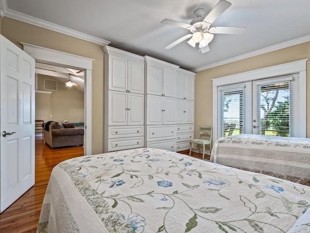 bedroom with dark hardwood / wood-style flooring, ceiling fan, and crown molding