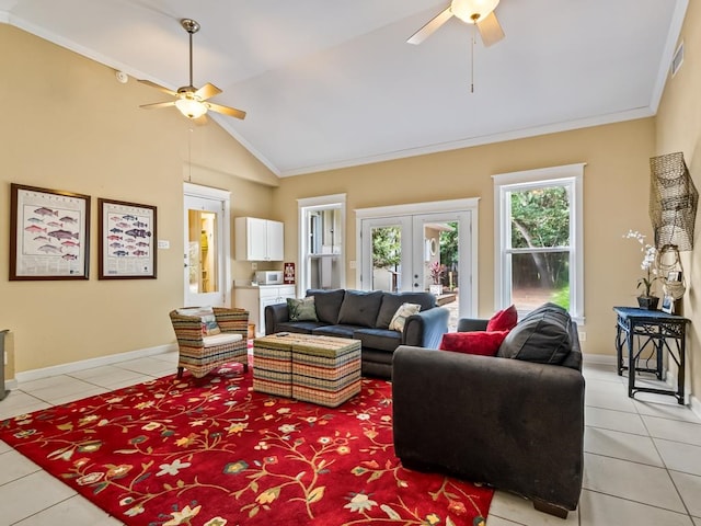 living room featuring high vaulted ceiling, ceiling fan, crown molding, and light tile patterned flooring