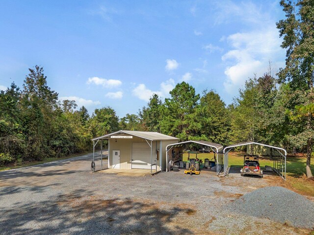 exterior space with a carport