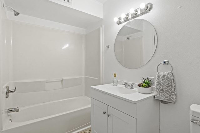 full bathroom featuring vanity, toilet, and  shower combination