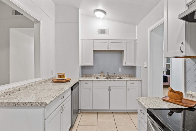 kitchen featuring white cabinetry, sink, stainless steel dishwasher, ventilation hood, and vaulted ceiling