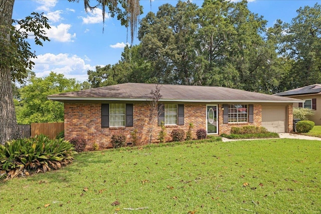 ranch-style home with a garage and a front yard