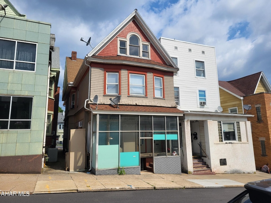 view of front of house with cooling unit