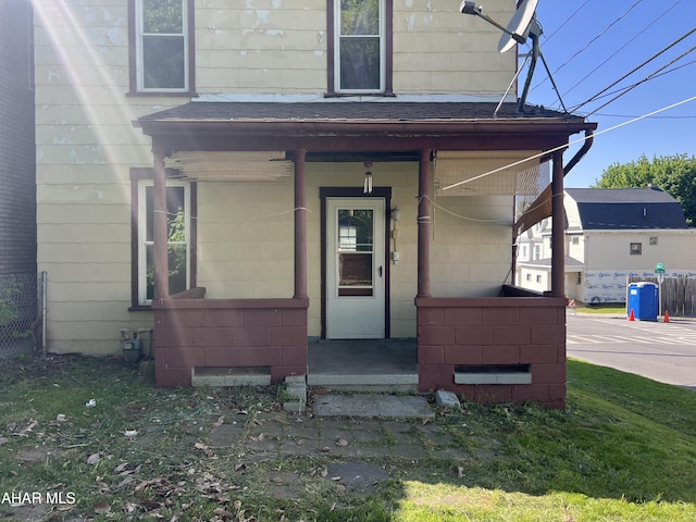 401 1st Ave, Altoona, PA 16602 - view of exterior entry with a porch and a shingled roof