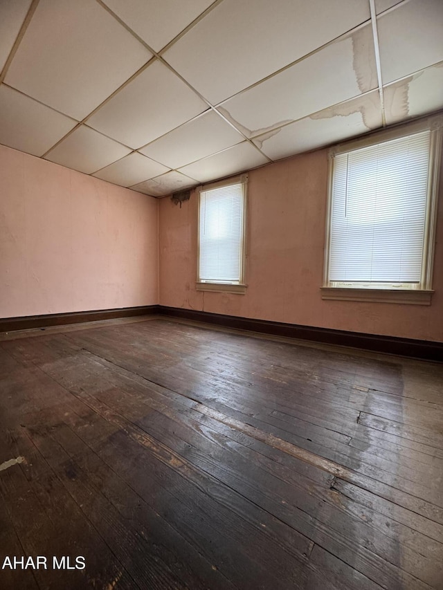 607 N N 8th Ave, Altoona, PA 16601 - unfurnished room with dark wood-type flooring and a paneled ceiling