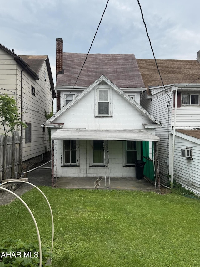 607 N N 8th Ave, Altoona, PA 16601 - back of house with a wall mounted AC and a patio area