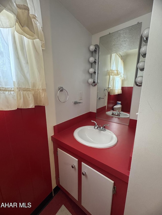607 N N 8th Ave, Altoona, PA 16601 - bathroom featuring vanity and a textured ceiling