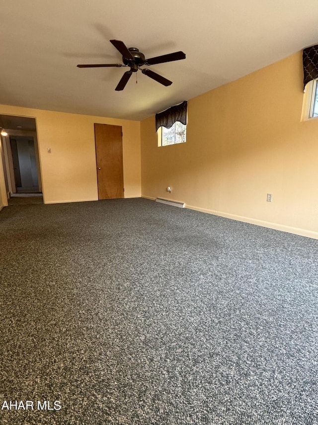 empty room with carpet flooring and ceiling fan