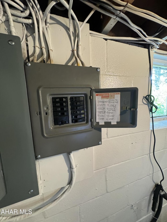 utility room featuring electric panel