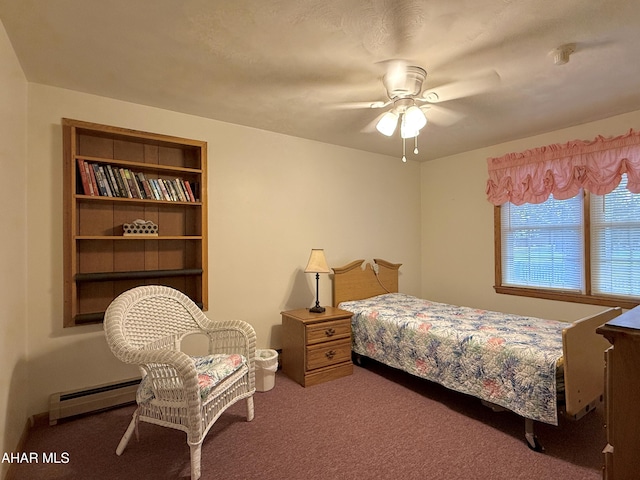 bedroom featuring dark colored carpet, a baseboard radiator, and ceiling fan