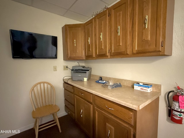 kitchen with a paneled ceiling