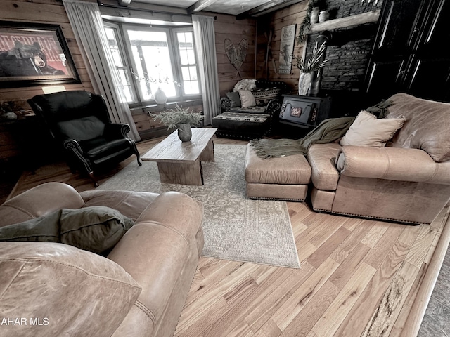 living room featuring wooden walls and light wood-type flooring