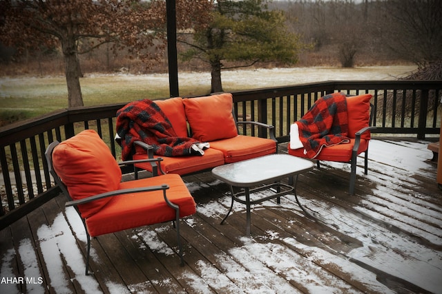 view of snow covered deck