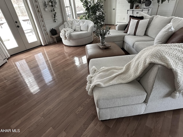 living room featuring hardwood / wood-style flooring and french doors