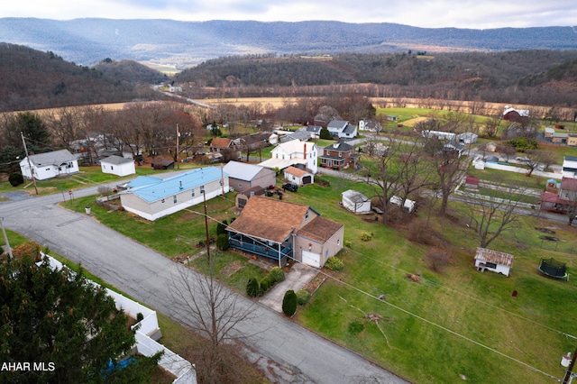 drone / aerial view featuring a mountain view