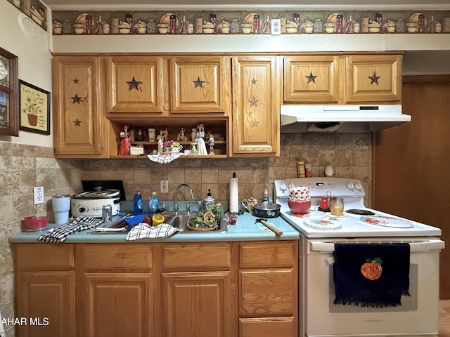 kitchen featuring white range with electric cooktop and tasteful backsplash