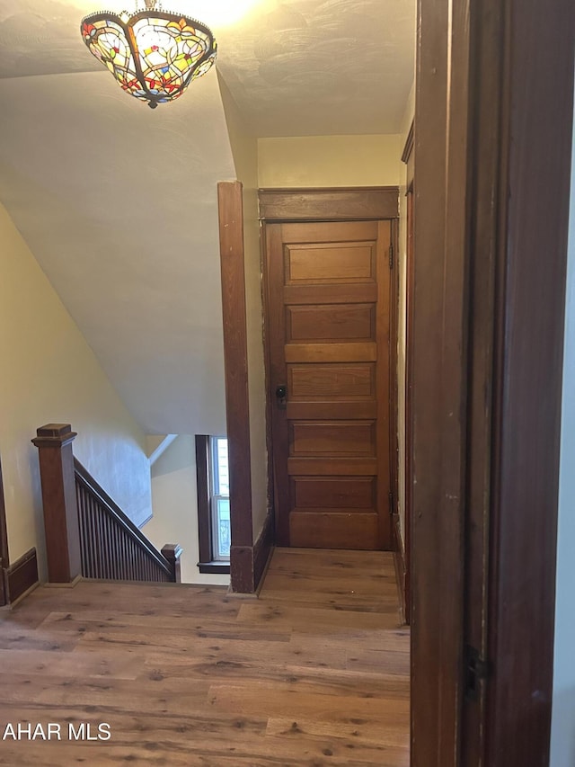 hall featuring hardwood / wood-style flooring