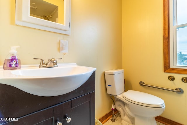 213 N Market St, Martinsburg, PA 16662 - bathroom with baseboards, toilet, and vanity