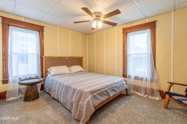 213 N Market St, Martinsburg, PA 16662 - carpeted bedroom with multiple windows and a ceiling fan