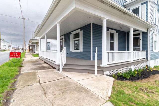 213 N Market St, Martinsburg, PA 16662 - view of property exterior featuring a porch