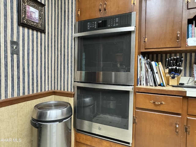 kitchen with stainless steel double oven