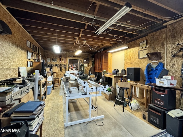 basement with a workshop area