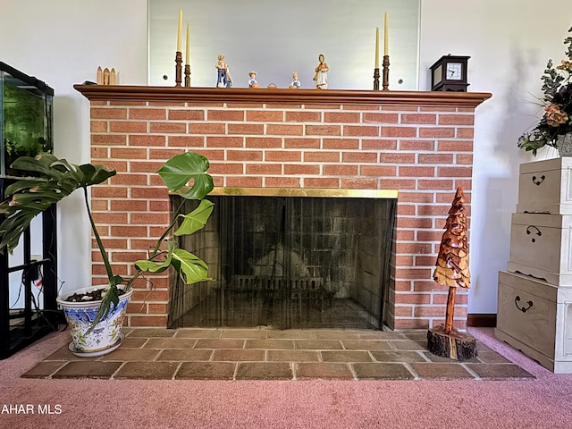 room details featuring carpet flooring and a fireplace