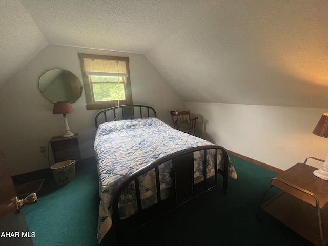 849-853 Fairview Rd, Howard, PA 16841 - carpeted bedroom featuring a textured ceiling and vaulted ceiling