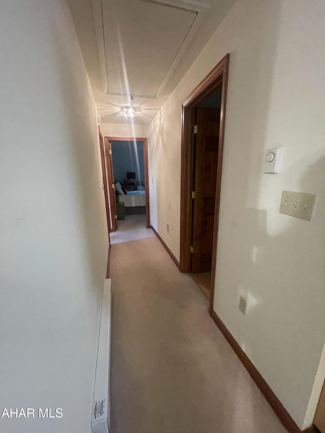 849-853 Fairview Rd, Howard, PA 16841 - corridor with attic access, light carpet, and baseboards