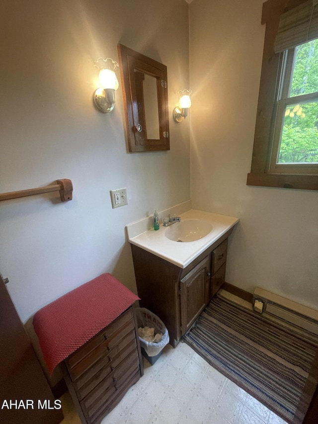 849-853 Fairview Rd, Howard, PA 16841 - bathroom with tile patterned floors, vanity, and a baseboard heating unit