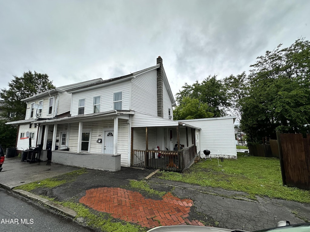 618-22 2nd Ave, Altoona, PA 16602 - multi unit property with covered porch and a chimney